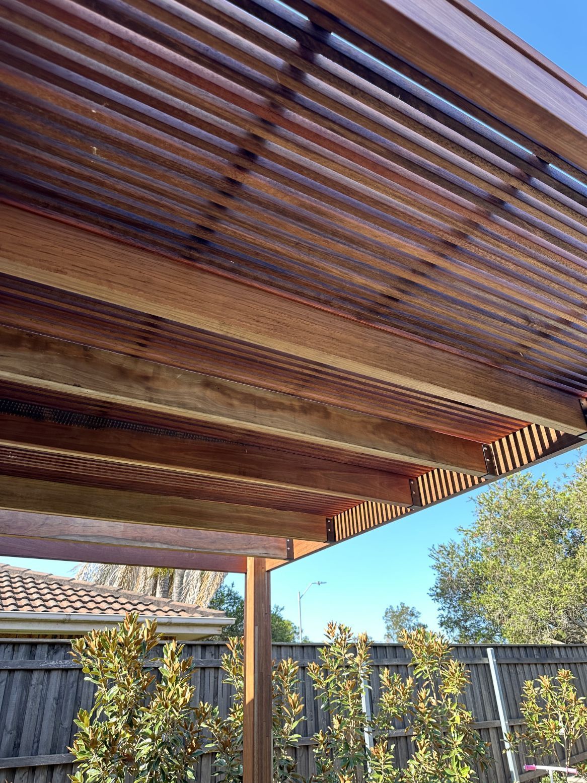 A Wooden Deck With Stairs Leading Up To It — Penman Projects In Salamander Bay, NSW