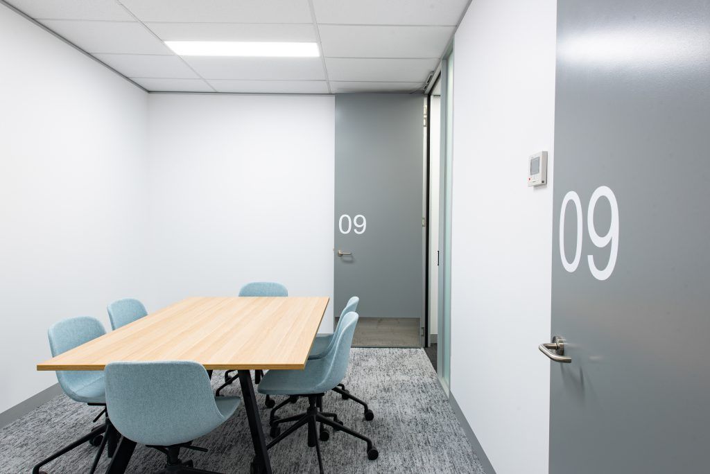A Conference Room With A Table And Chairs And The Number 09 On The Door — Frank Plumbing In Delacombe, VIC