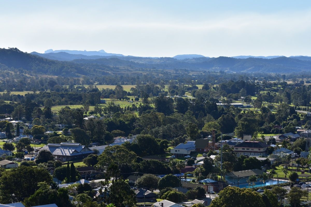 An Aerial View of a Residential Area With Mountains in the Background — Tallow Tree Services Pty Ltd in Kyogle, NSW