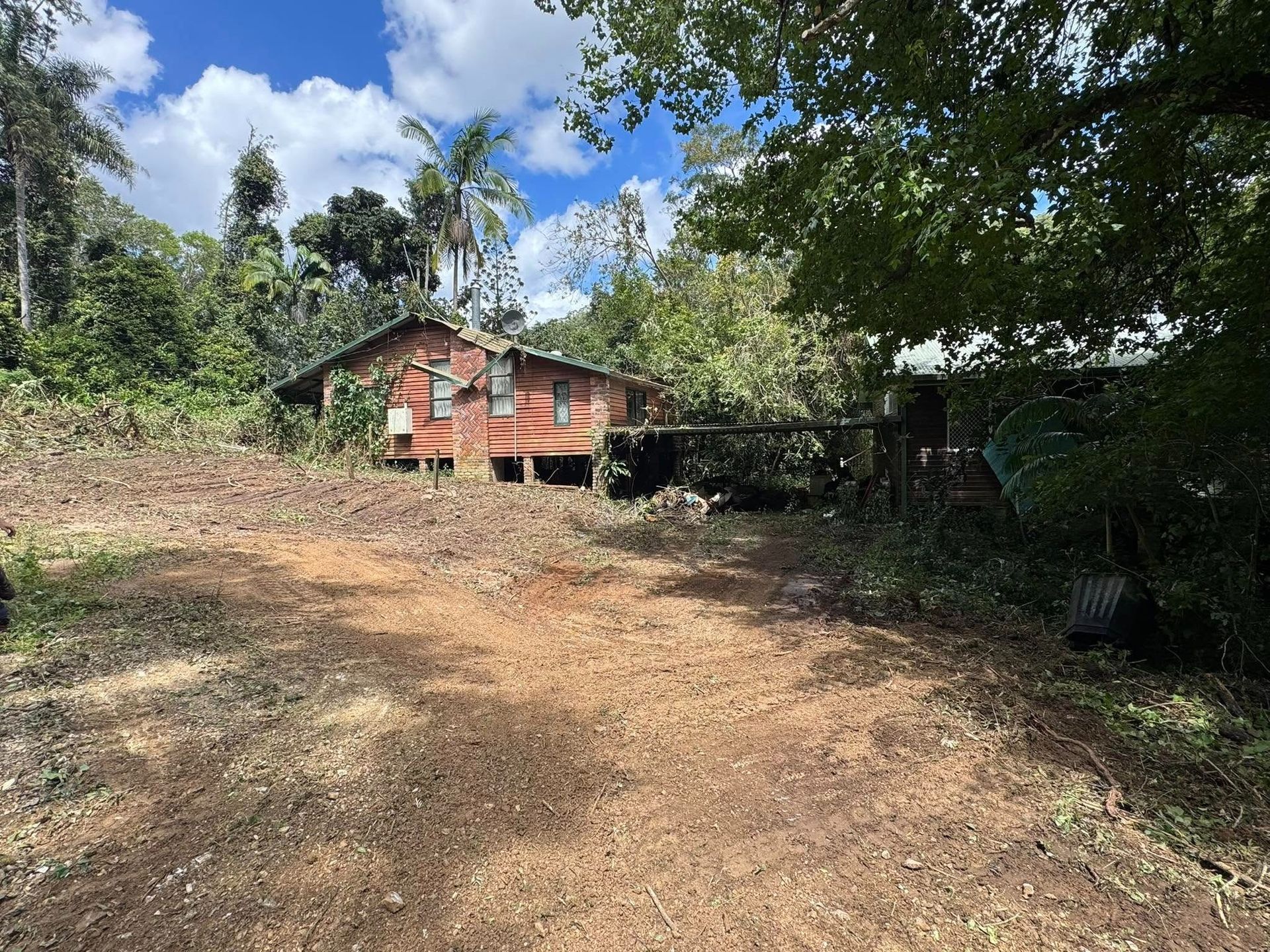 House on Coastal Area Surrounded by Trees