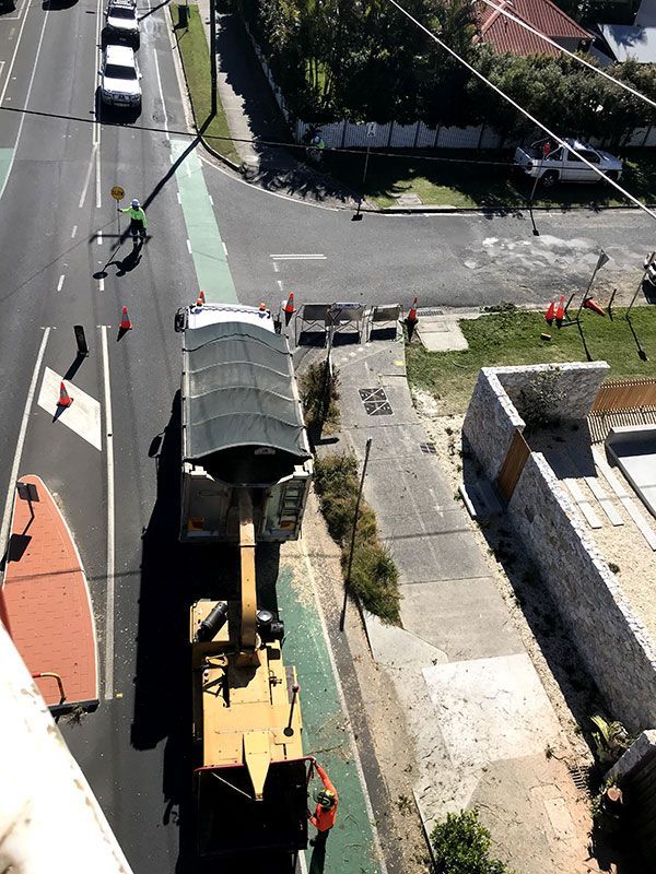 Aerial View of a Construction Vehicle on the Side of a Road — Tallow Tree Services Pty Ltd in Bangalow, NSW
