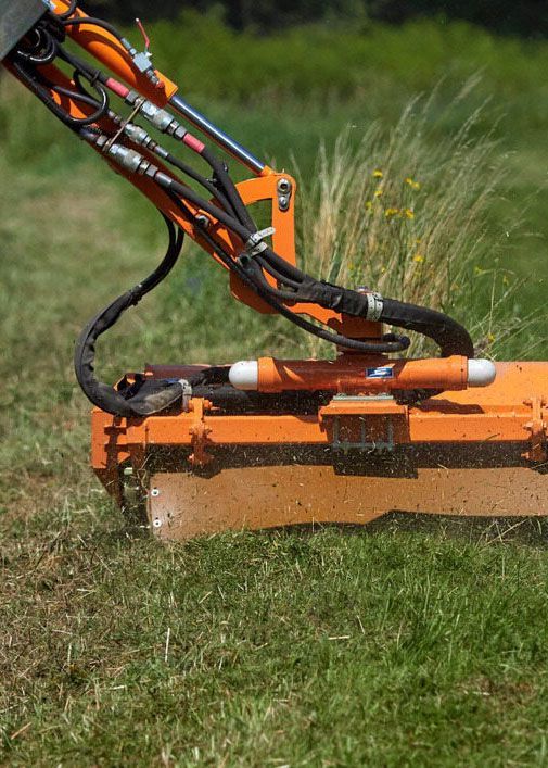 Efficiently Slashing Field Grass With Precision — Tallow Tree Services Pty Ltd in Bangalow, NSW