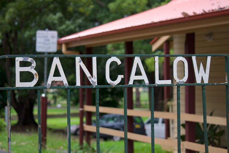 A Fence With the Word Bangalow on It — Tallow Tree Services Pty Ltd in Bangalow, NSW