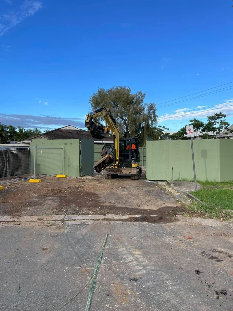 A Construction Site With a Bulldozer and a Tree in the Background — Tallow Tree Services Pty Ltd in Yamba, NSW