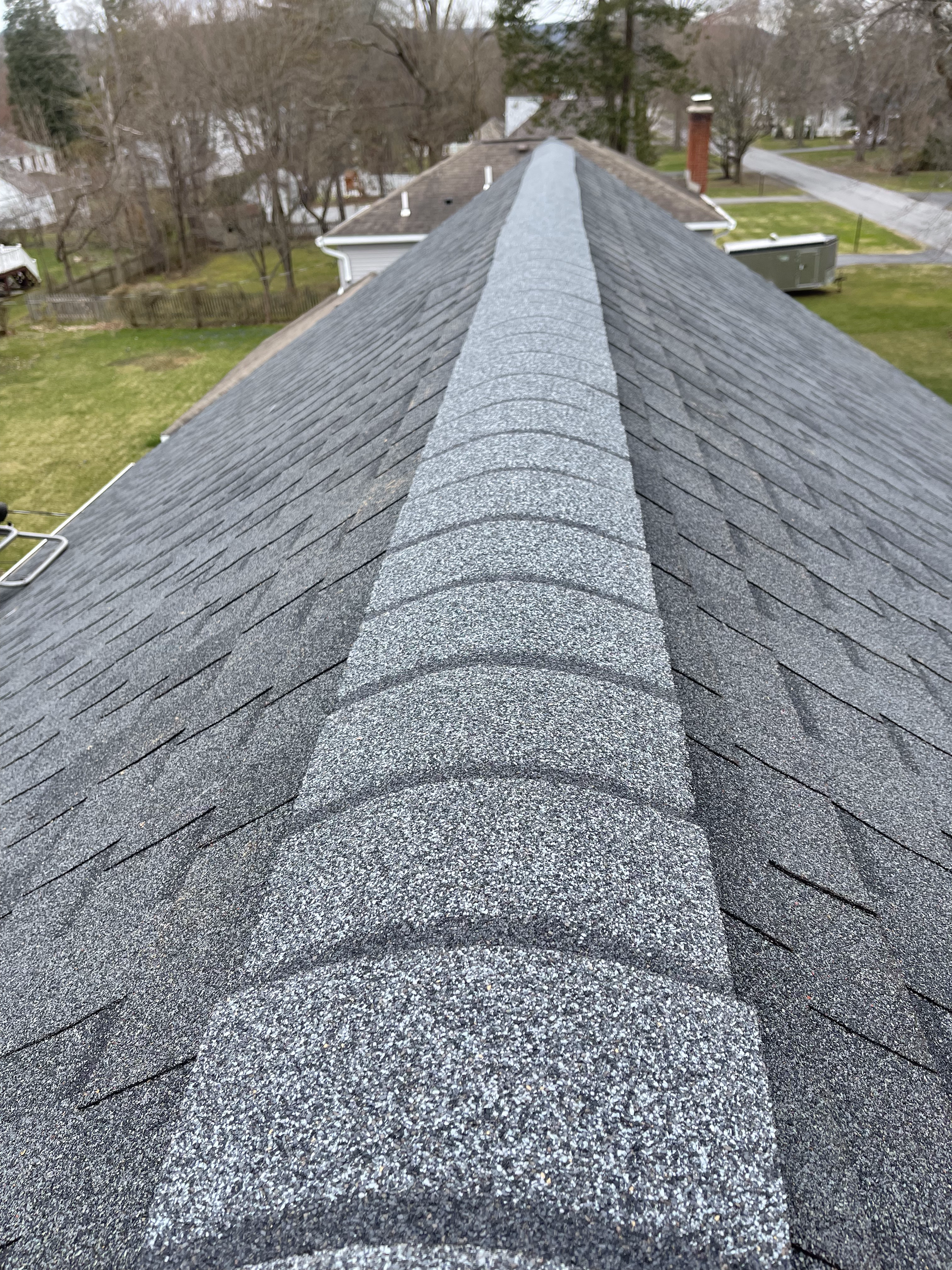 A close up of a roof with shingles on it.