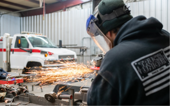 A Man is Welding in Albuquerque, NM - Trucks Unique