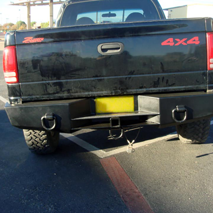 A Black 4x4 Truck is Parked in a Parking Lot - Truck Unique