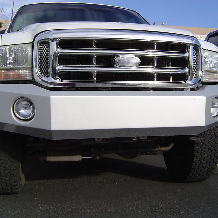 White Ford is Parked on the Street in Albuquerque, NM - Trucks Unique