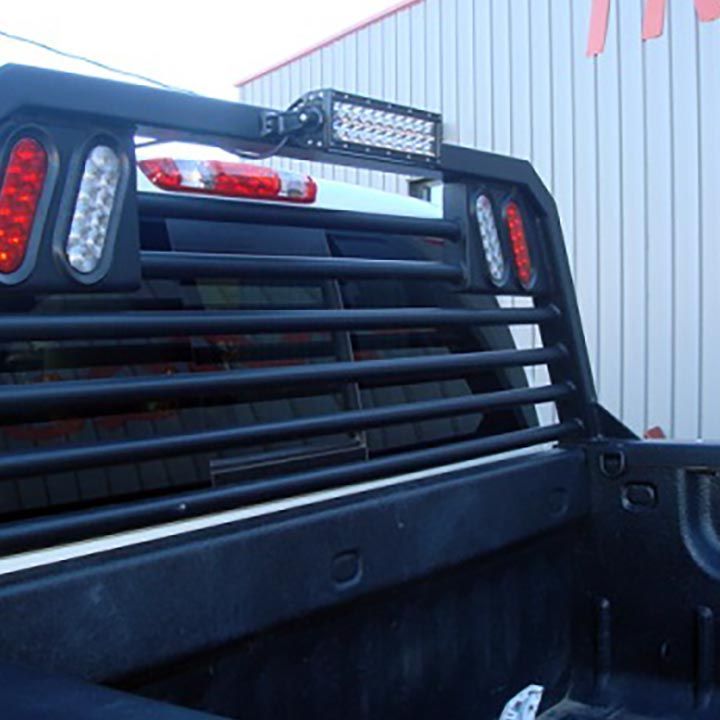 The Back of a Truck With a Light on Top of it - Truck Unique