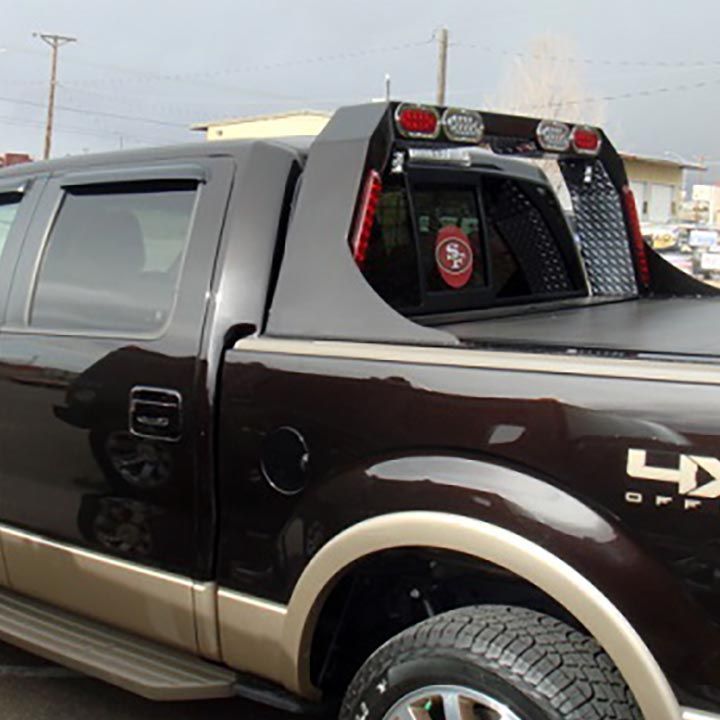 A Black Truck With 4x4 Written on the Side - Truck Unique