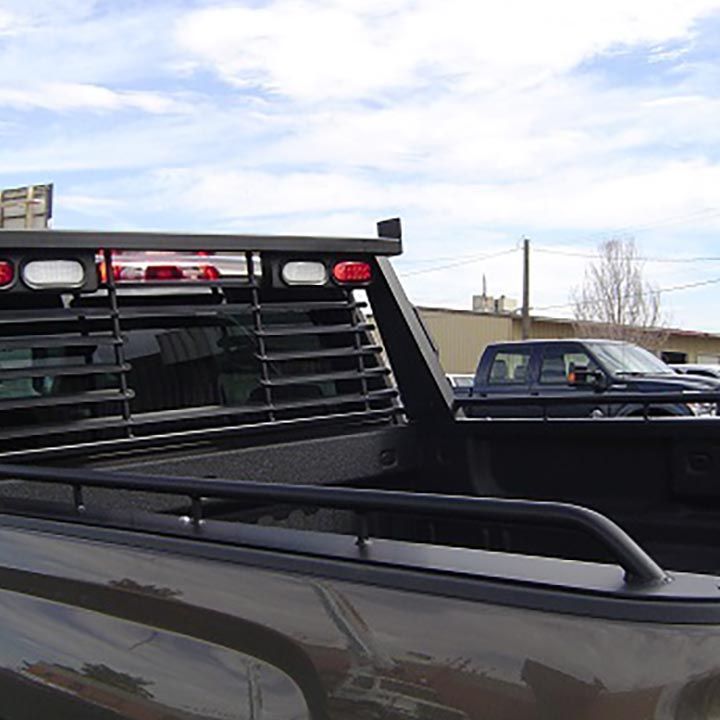Two Trucks are Parked Next to Each Other in a Parking Lot - Truck Unique