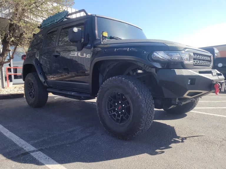Grey Truck With Big Wheels and Tires - Trucks Unique