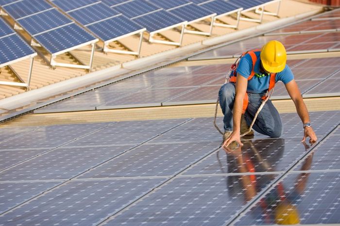 Worker Installing Solar Panel - Aledo, Texas - Parker County Solar