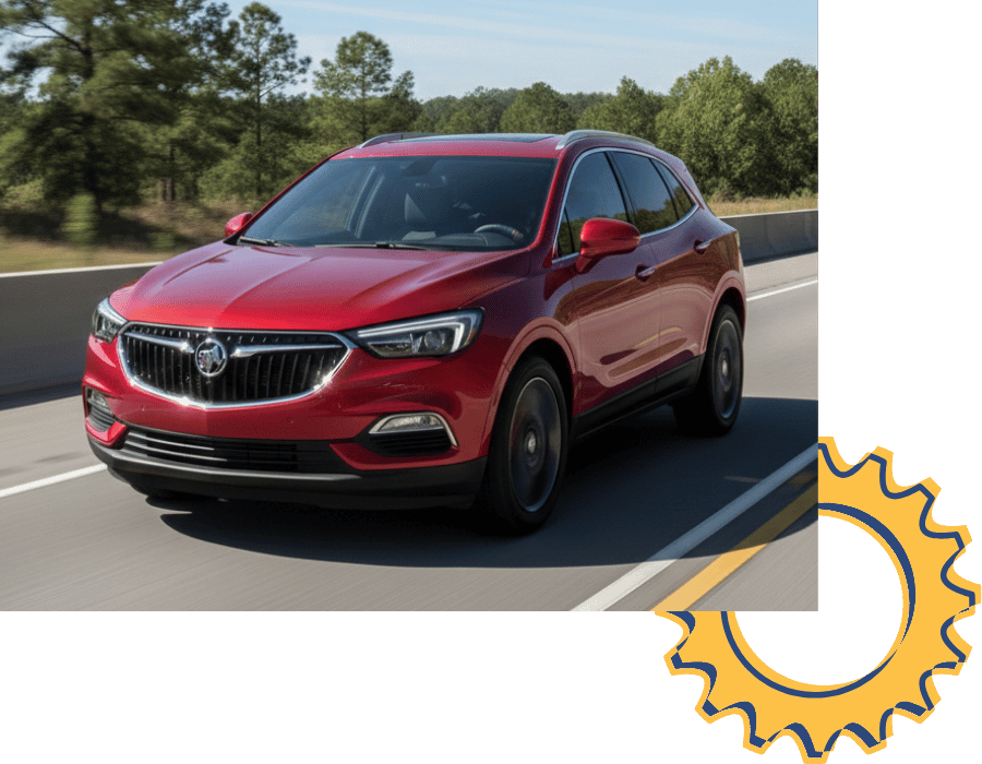 Buick Envision SUV driving on open highway.