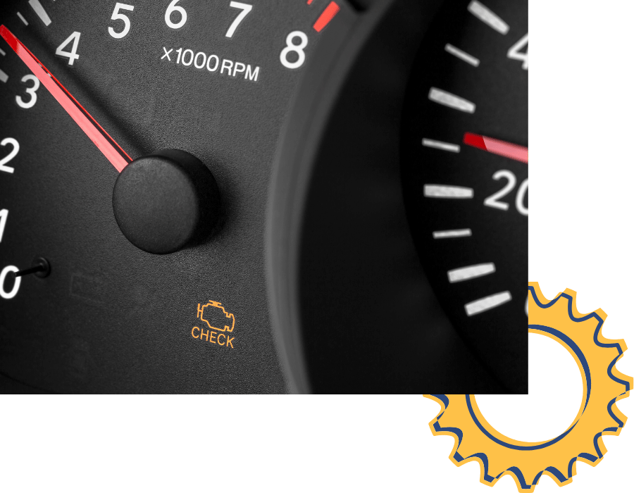 Dashboard gauge cluster with illuminated check engine light warning indicator.