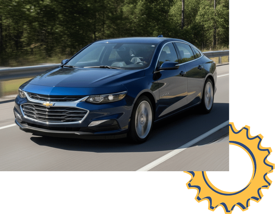 Chevrolet Malibu sedan driving on highway.
