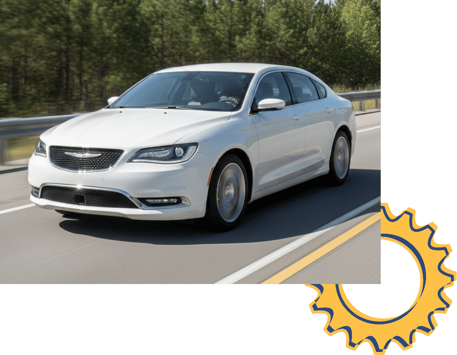 Chrysler 300 sedan driving on open road.