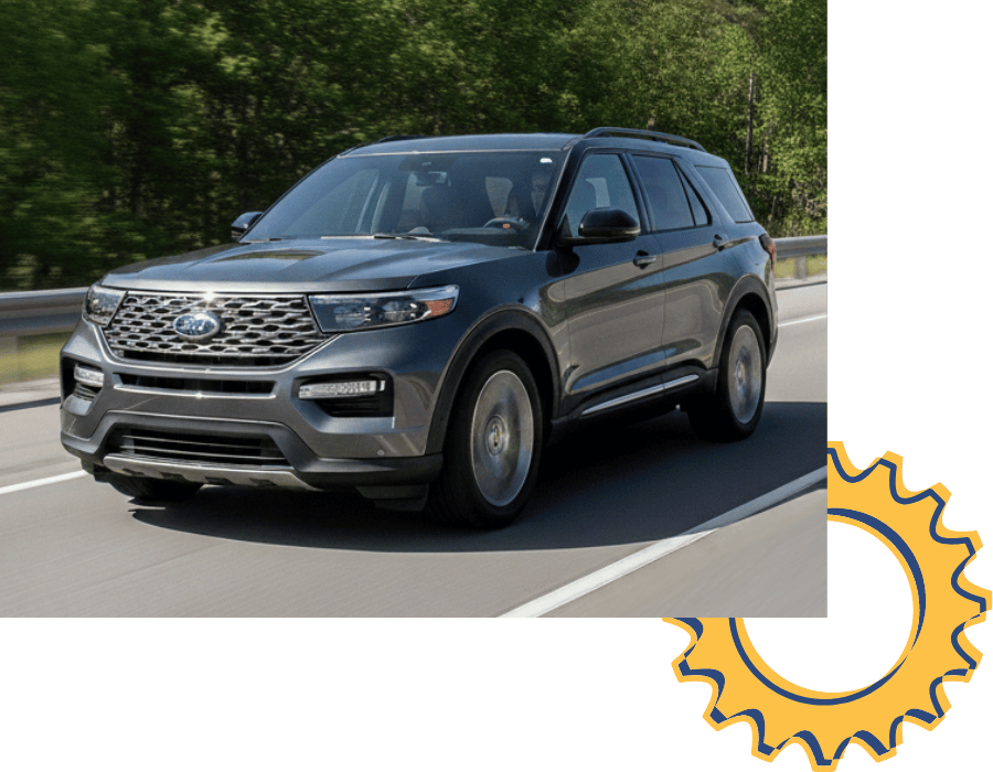 Ford Explorer SUV driving on highway.