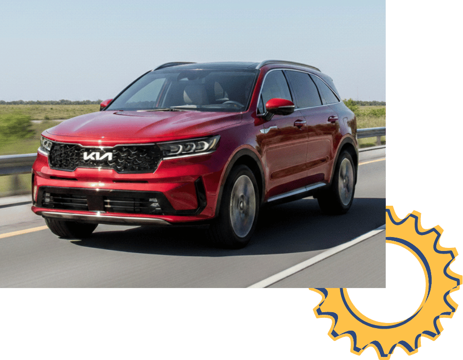 Kia Sorento SUV driving on highway.