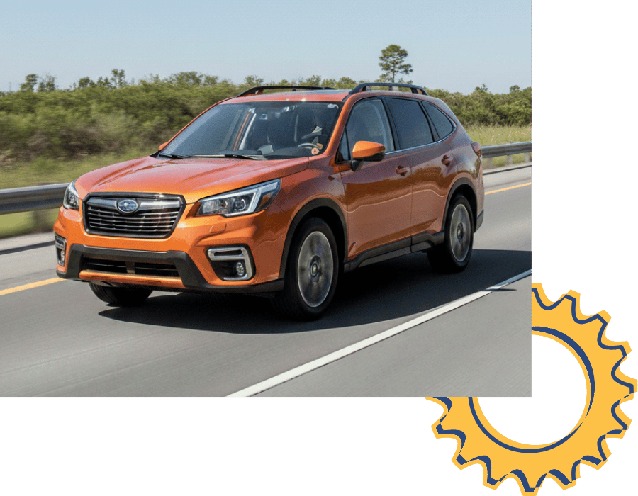 Subaru Forester SUV driving on highway.