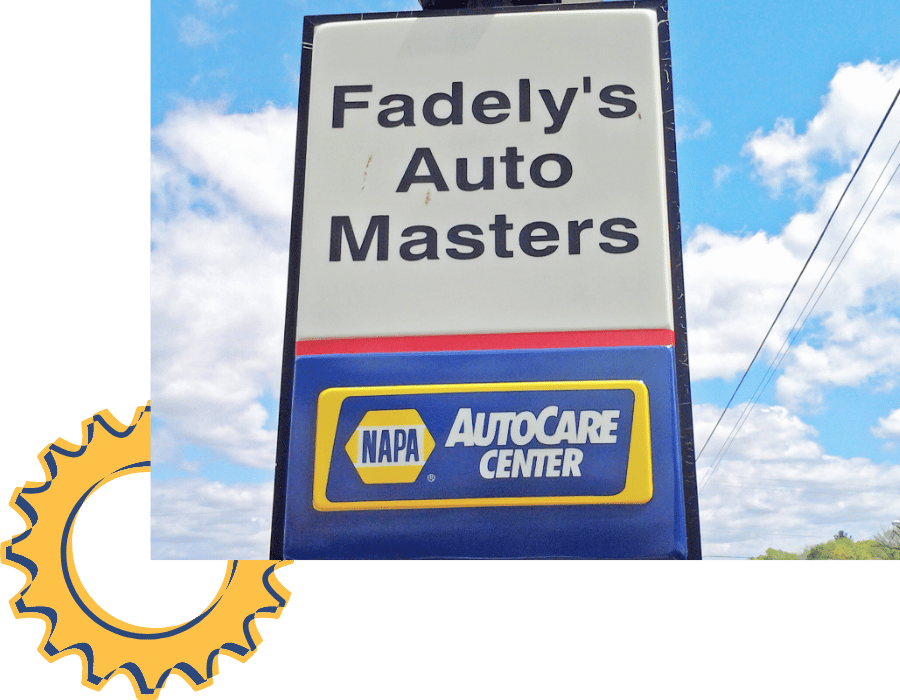 Fadely&rsquo;s Auto Masters roadside sign with NAPA AutoCare Center branding.
