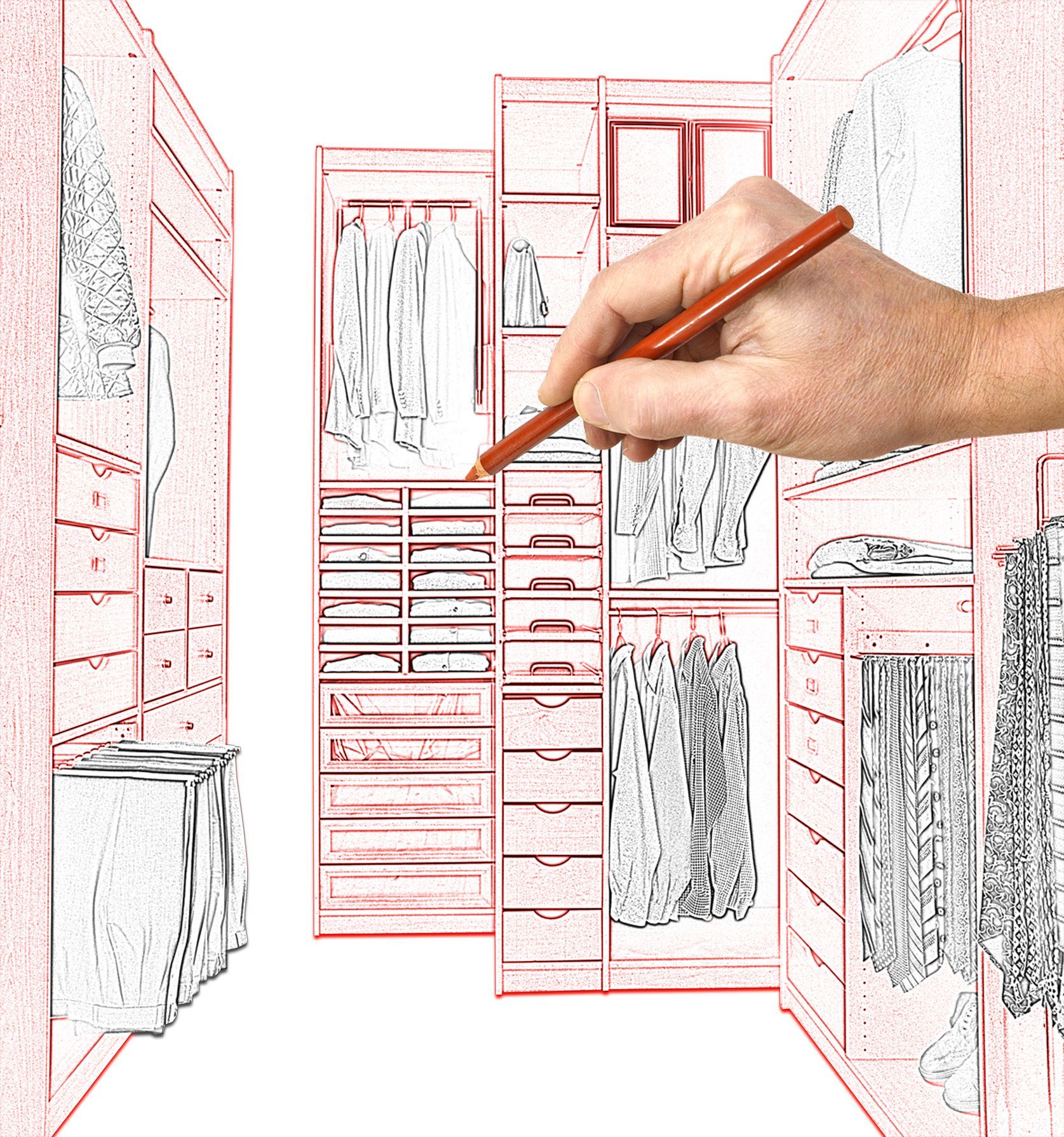 Hand drawing a custom closet design with a red pencil.