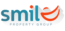 Logo for Smile Property Group, featuring turquoise text and an orange smile.