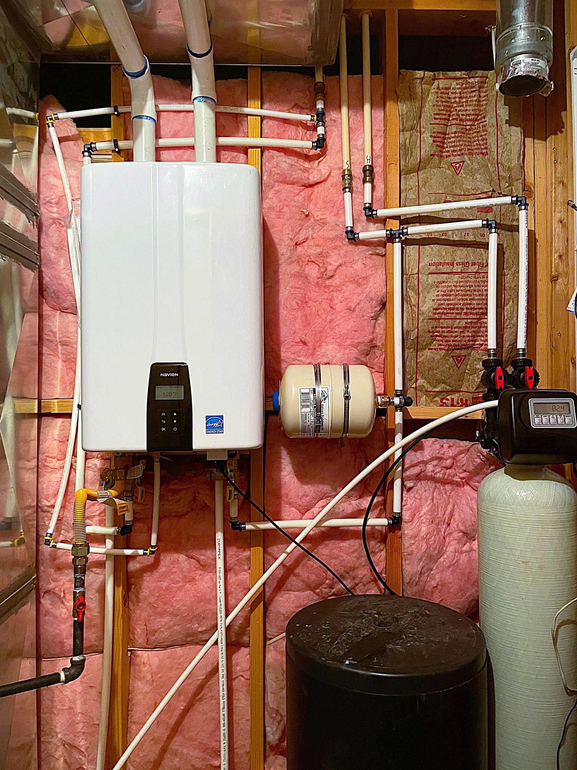 Old tank water heater replaced with efficient model by Sharp Water Solutions in Salt Lake Valley, reducing scale buildup