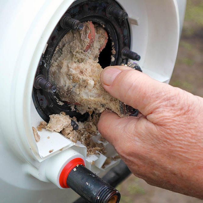 Sharp Water Solutions - Sediment buildup in water heater tank