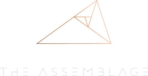 A logo for a company called the assemblage with a triangle on a white background.