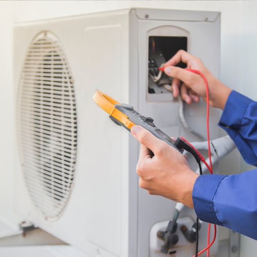 A living room filled with cardboard boxes and a couch.