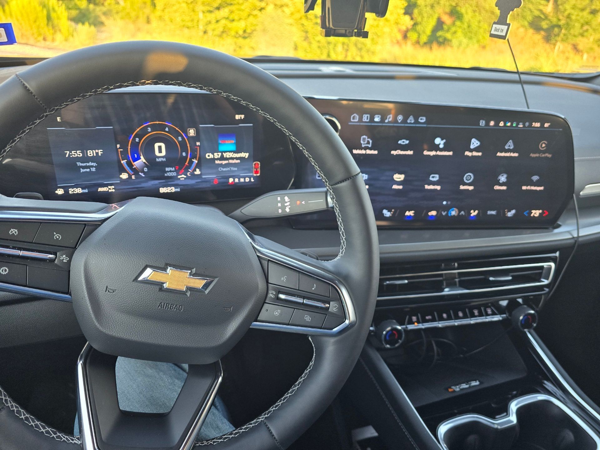 The inside of a Chevy Traverse with a steering wheel and dashboard