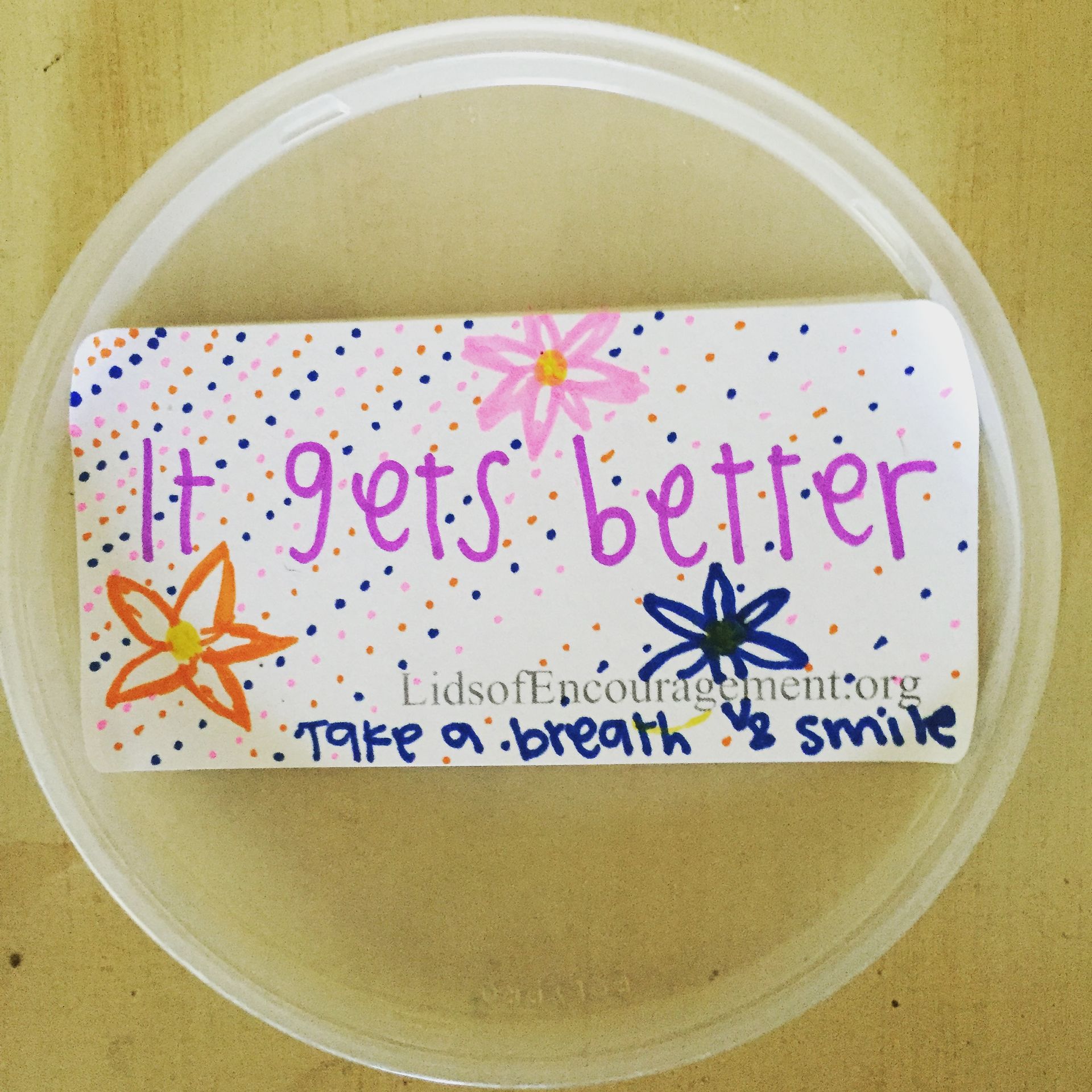 A sticker that says it gets better on it