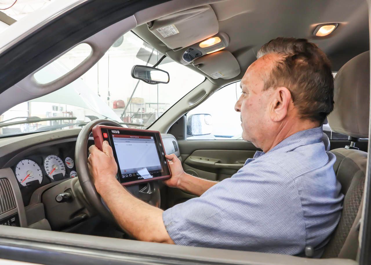 Car Diagnostic Scan Inside Vehicle | Andy's Auto Repair & Tires Inc.