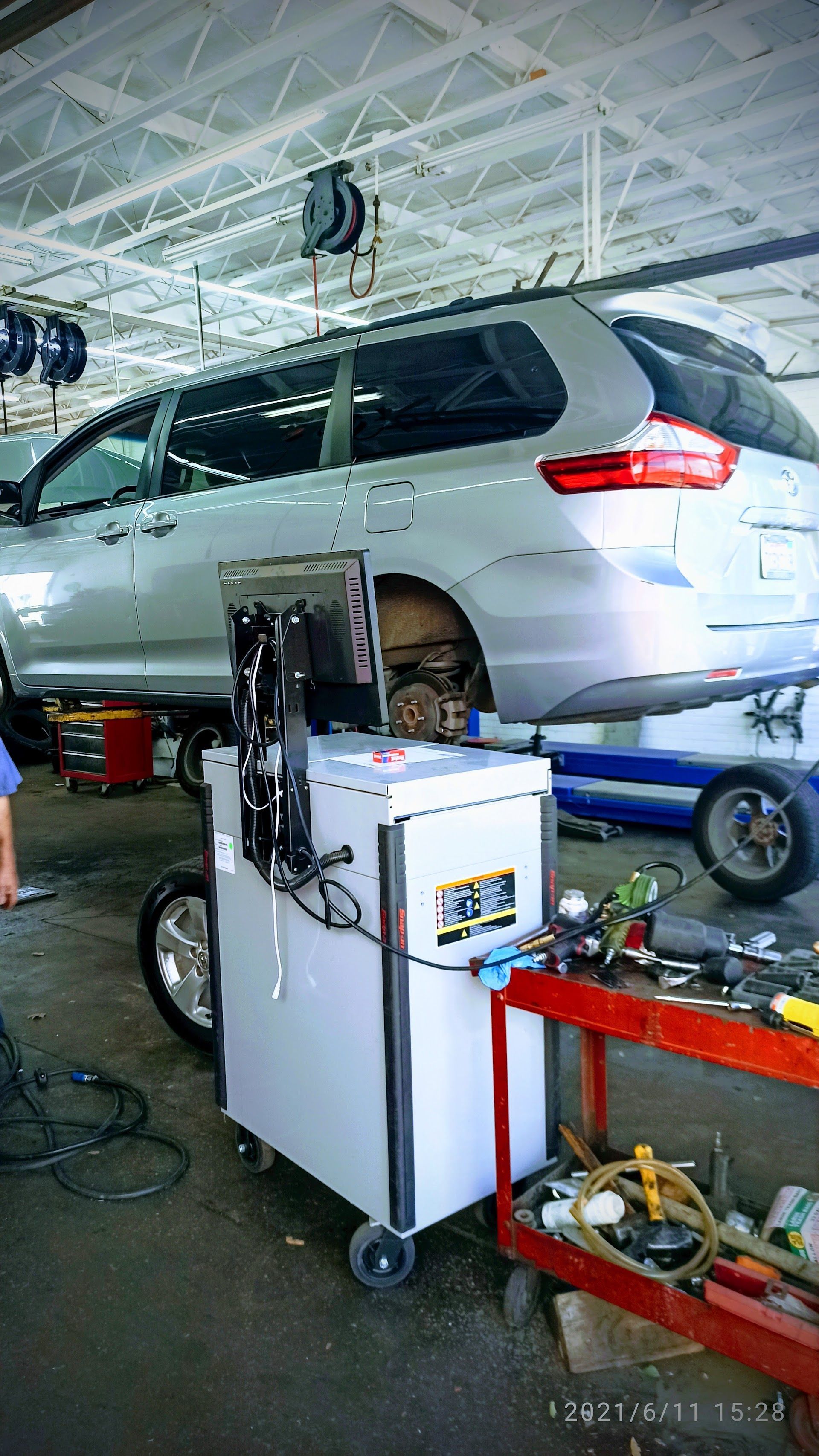 Auto Repair Equipment In Service Bay | Andy's Auto Repair & Tires Inc.