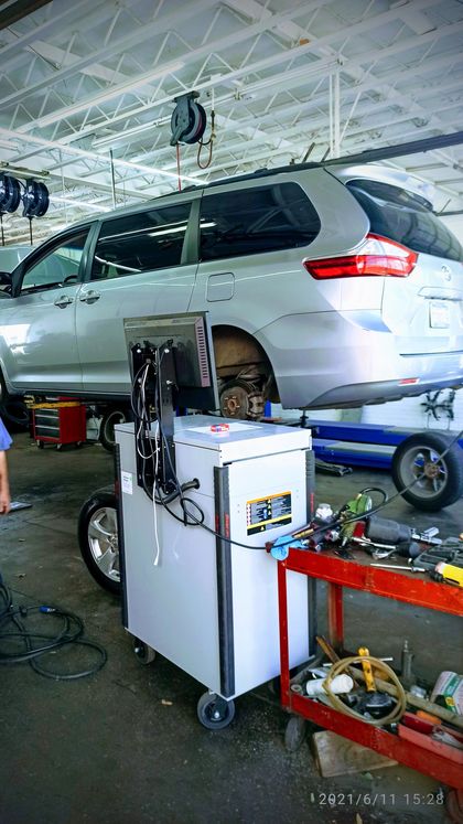 Auto Repair Equipment In Service Bay | Andy's Auto Repair & Tires Inc.