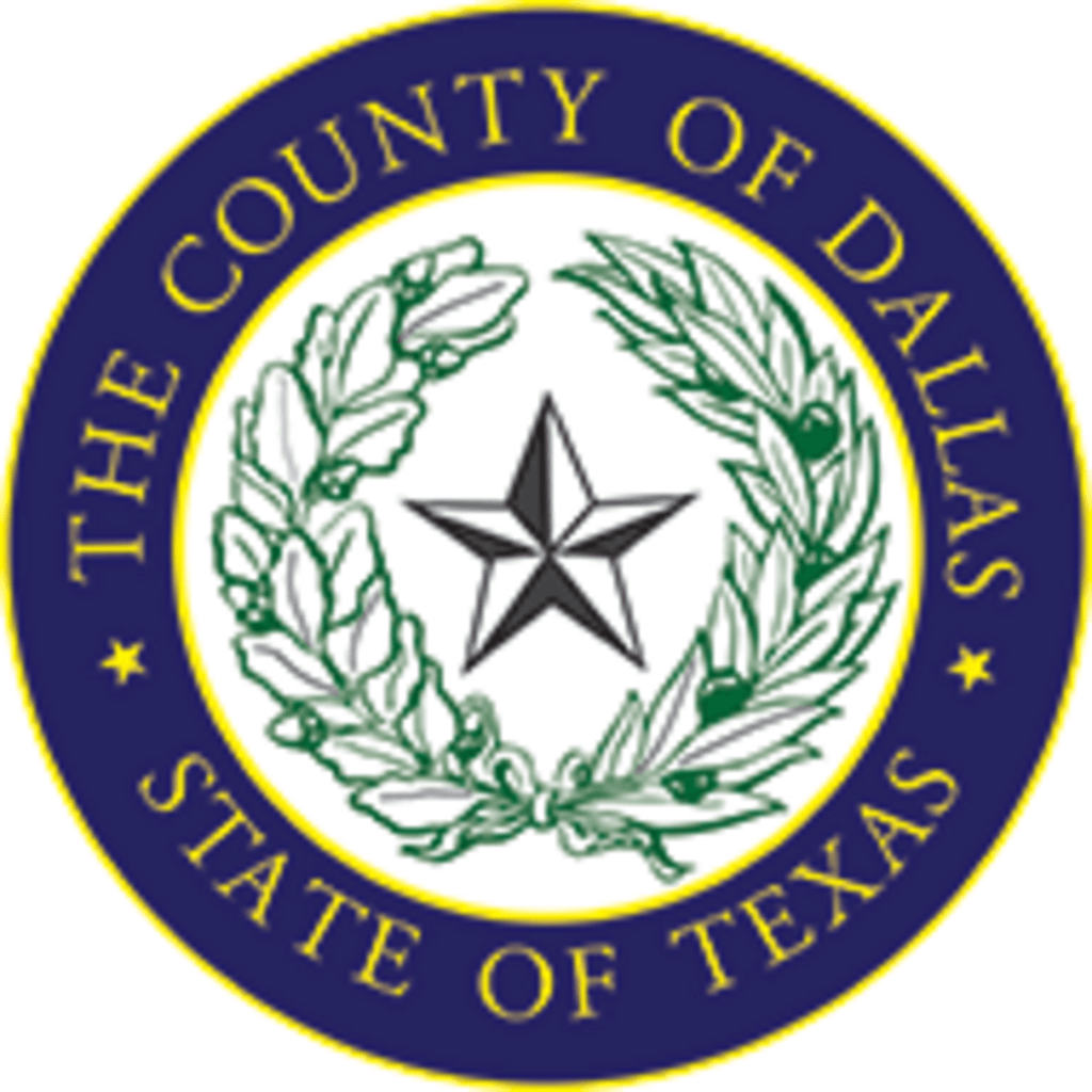 Seal of Dallas County, Texas: blue ring with text, green wreath, central star.