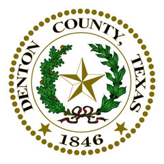 Denton County, Texas seal: gold star, wreath, and "Denton County, Texas 1846" in gold on a white background.