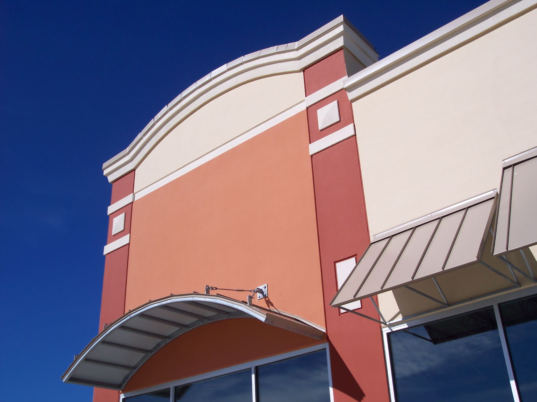 A building with a canopy on the side of it