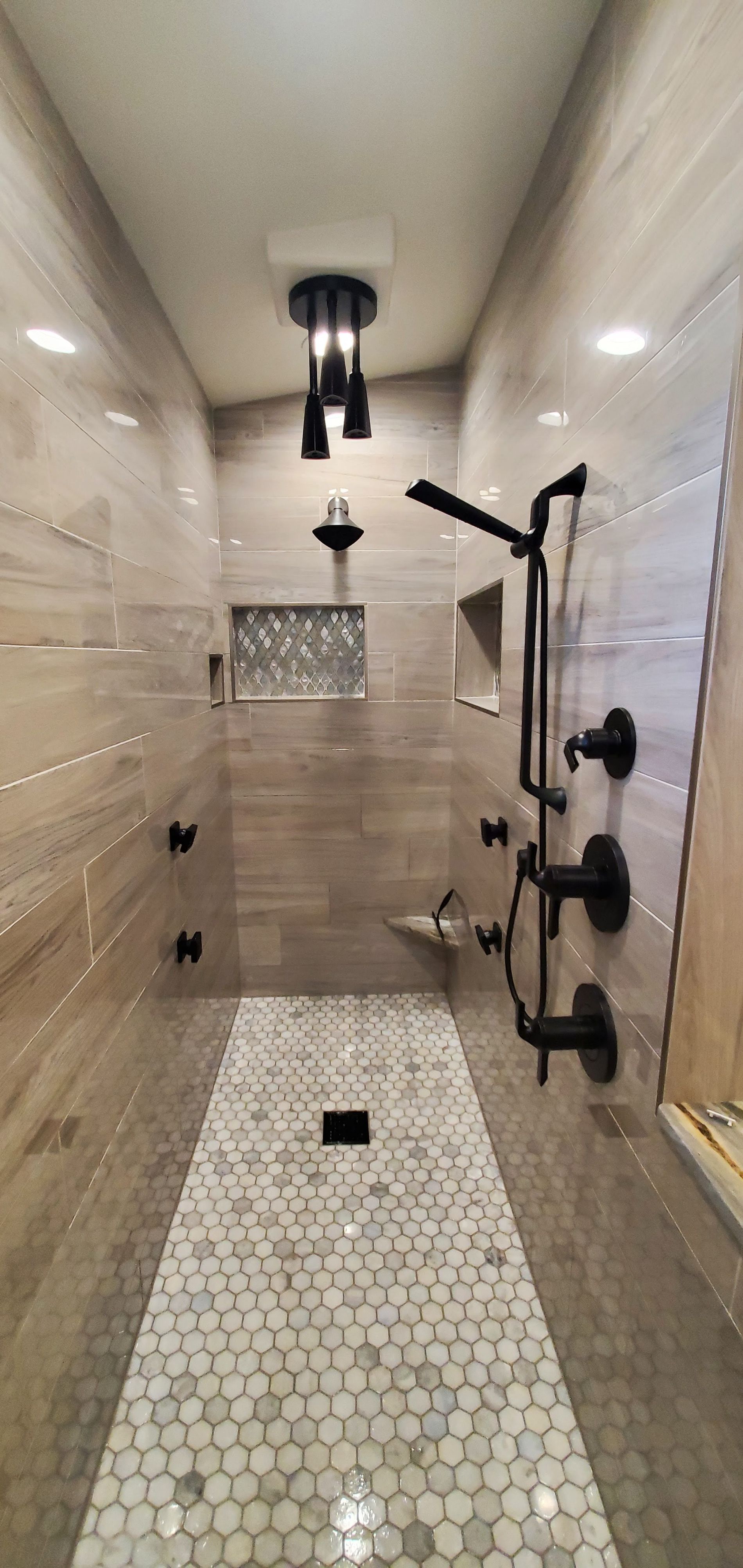 Renovated shower with black fixtures