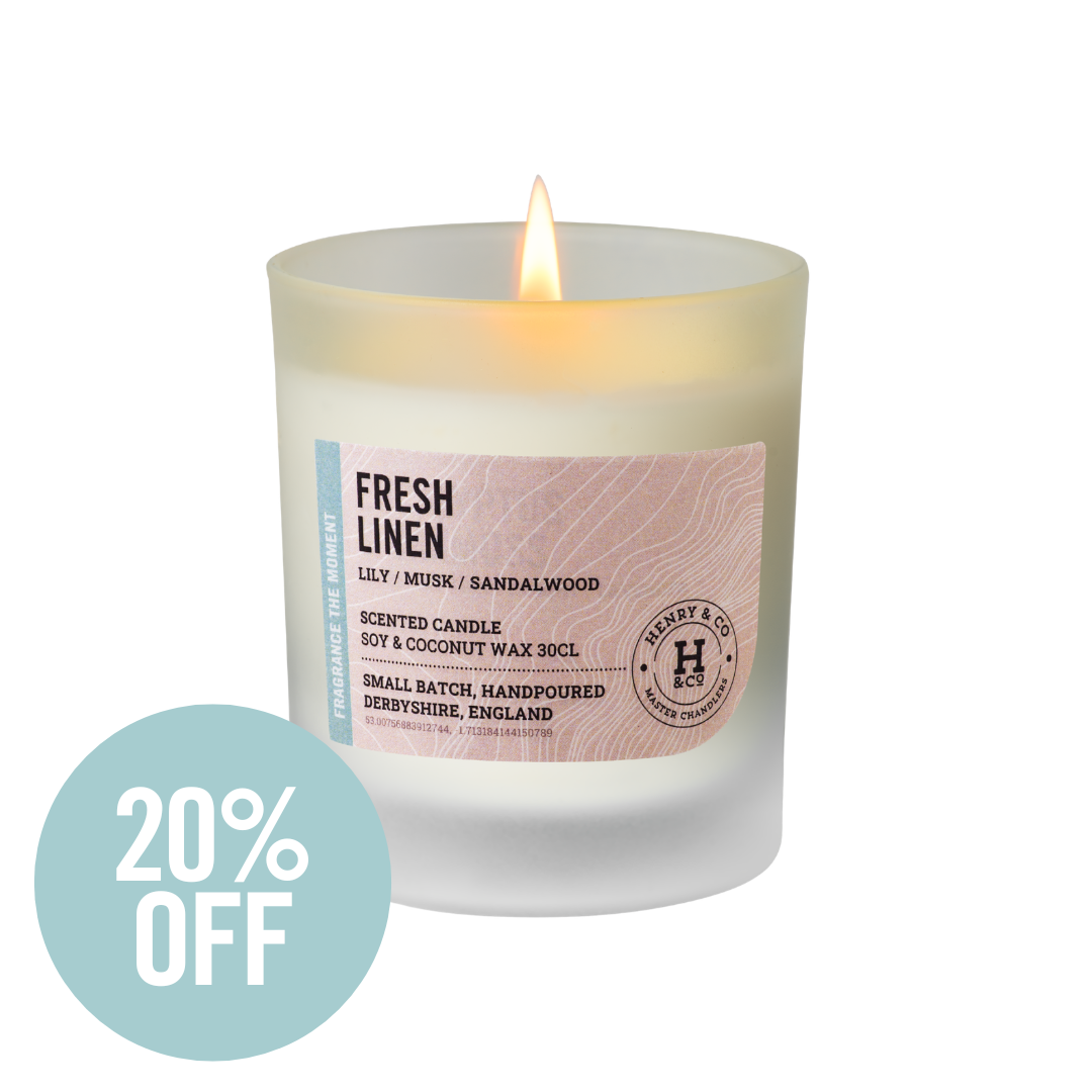 fresh linen scented candle lit