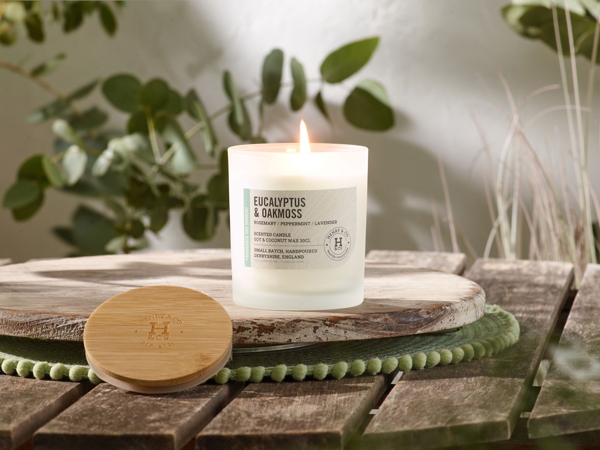 Eucalyptus & Oakmoss scented candle.