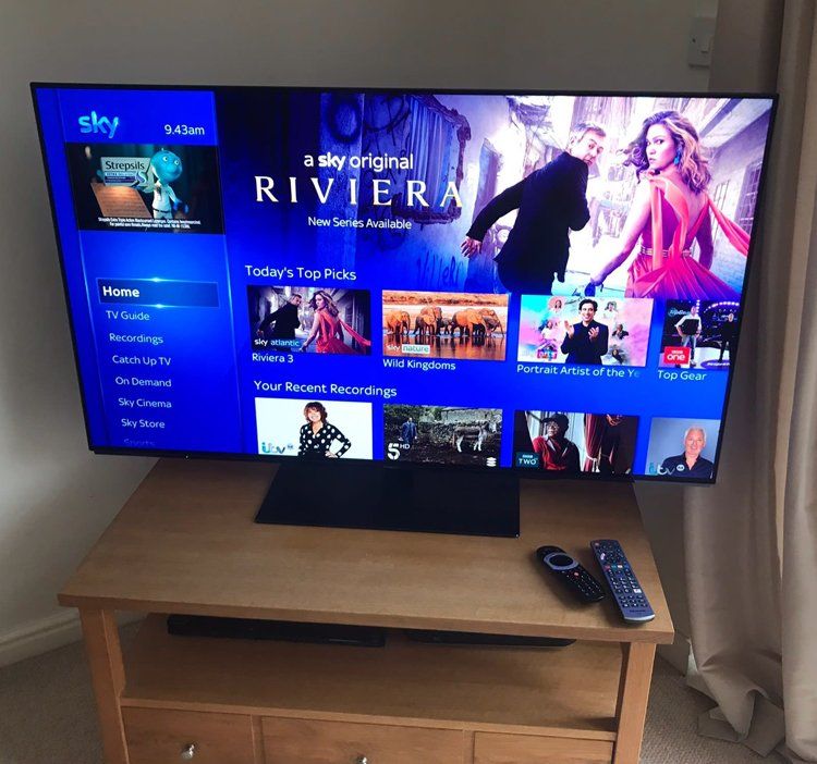 Working TV showing Sky satellite home page.