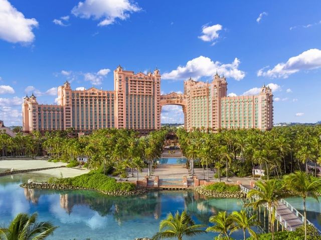 Atlantis paradise island surrounded by palm trees and a body of water