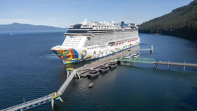 carnival cruise ship floating in the ocean at night