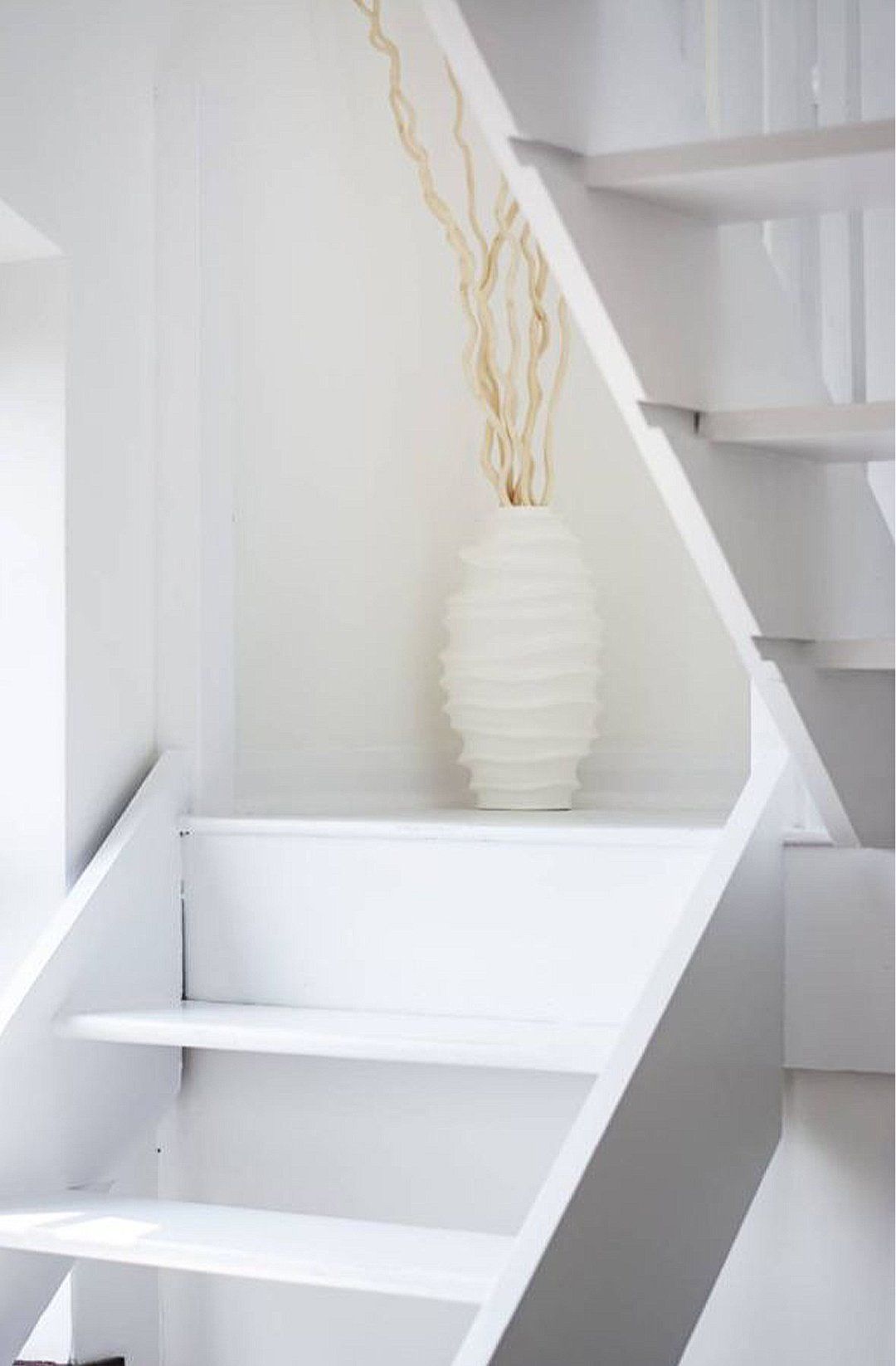 White wooden stairs closeup interior design