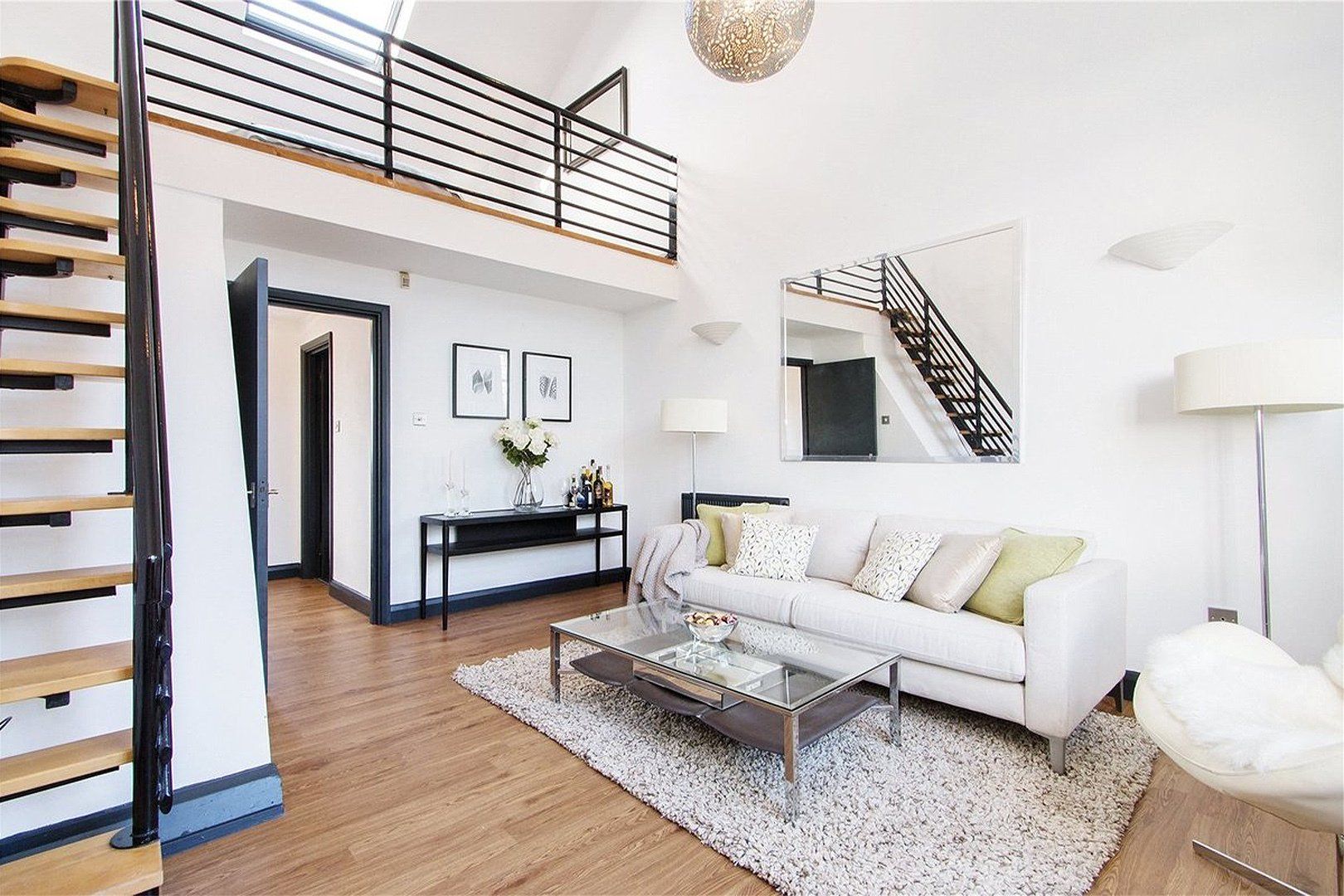 Livingroom with open space bedroom at the first floor interior design