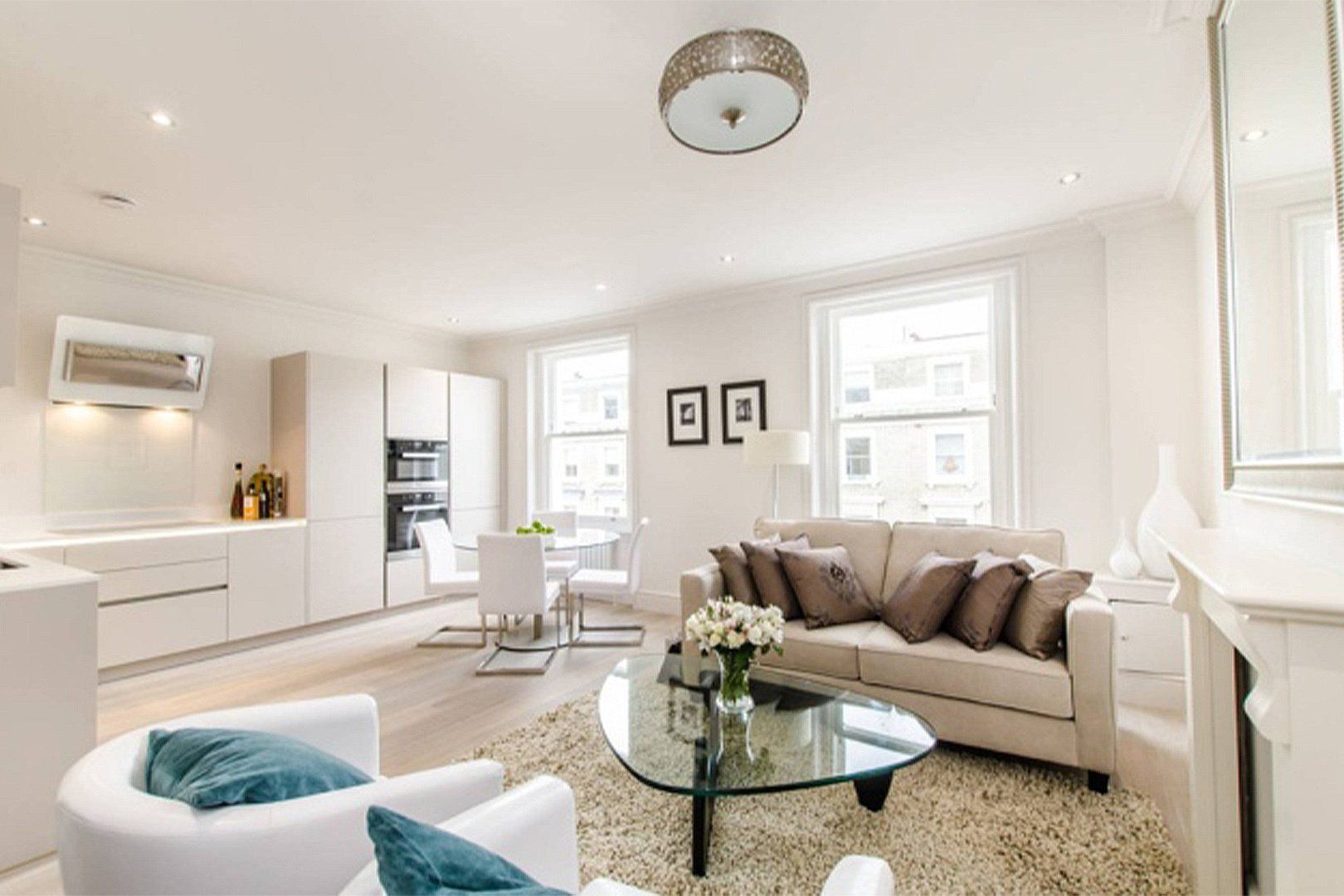 Open space with livingroom, kitchen and dining area interior design