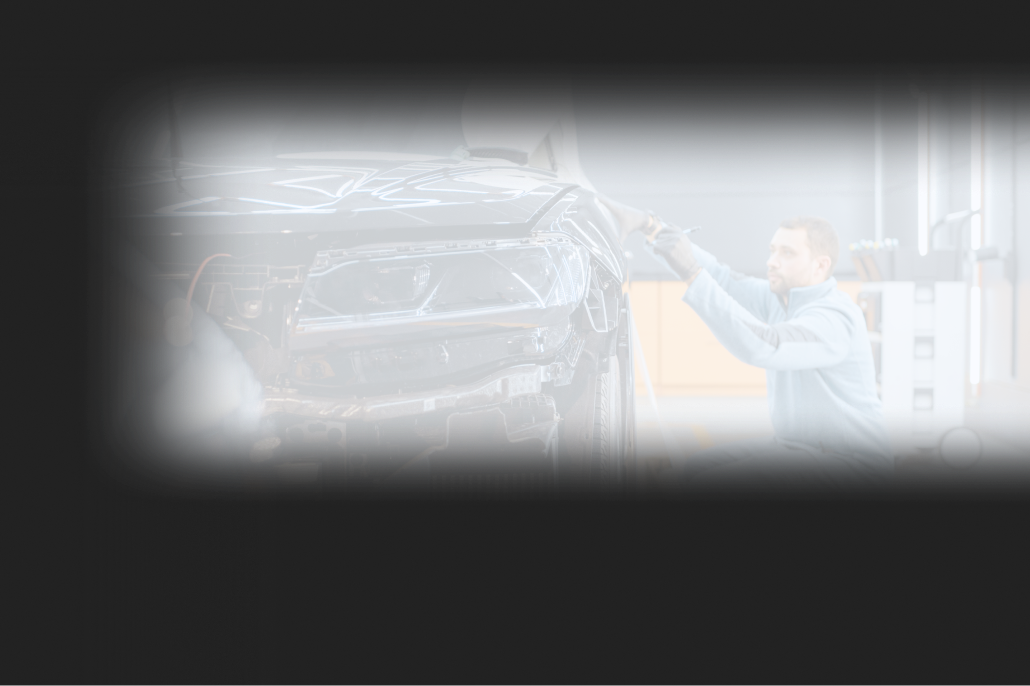Cars are parked in a garage | Tint World LI