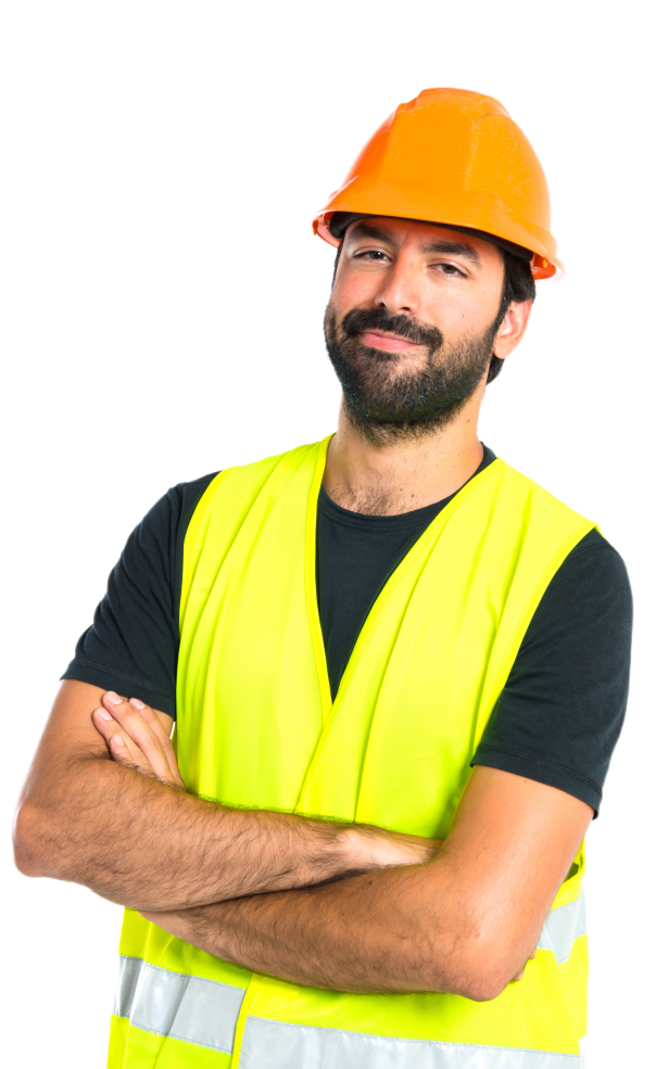 A man wearing a hard hat and a yellow vest is standing with his arms crossed.